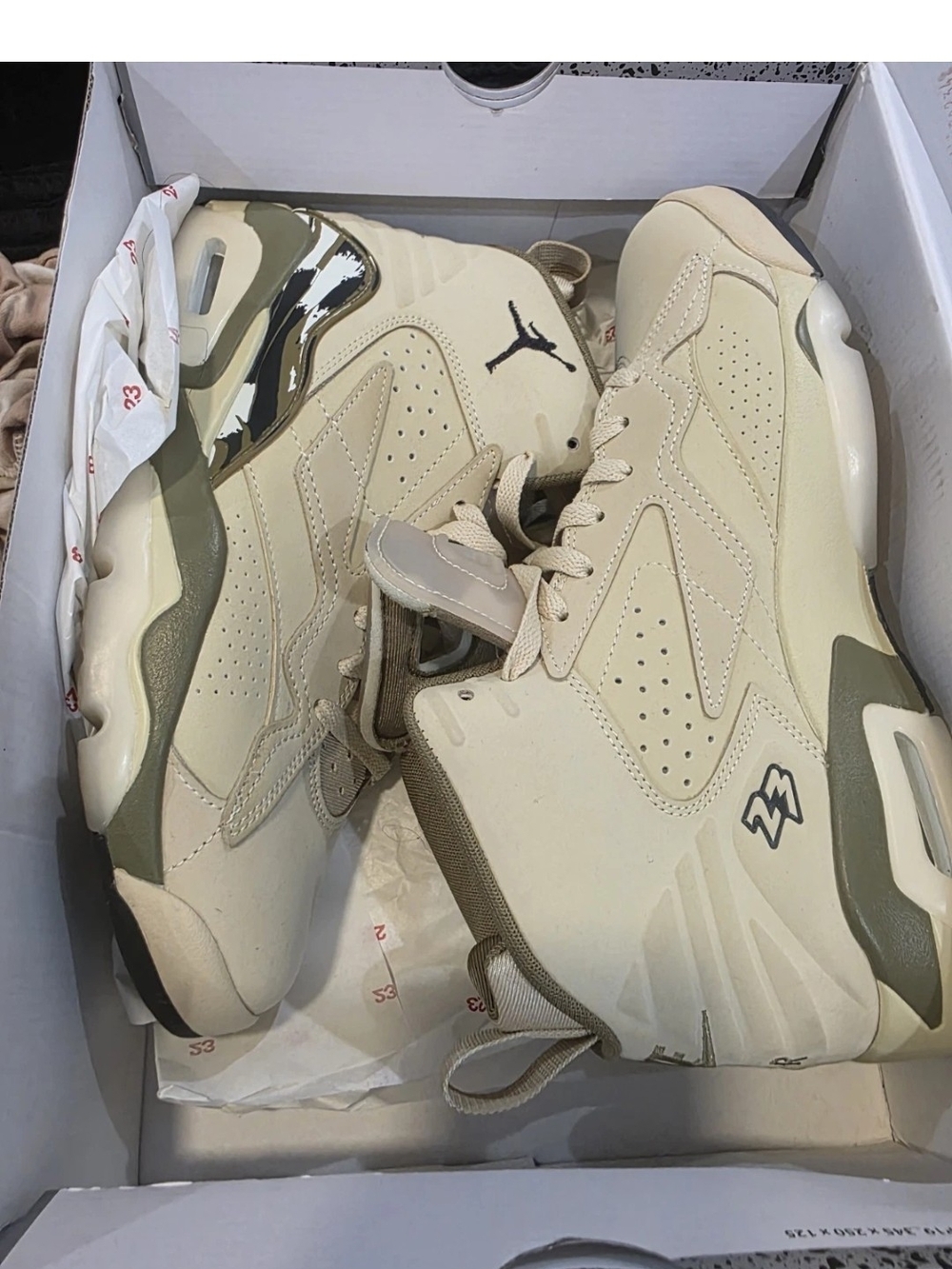 Jordan Air Jordan 4 Retro High-Top Sneakers in Beige & Black